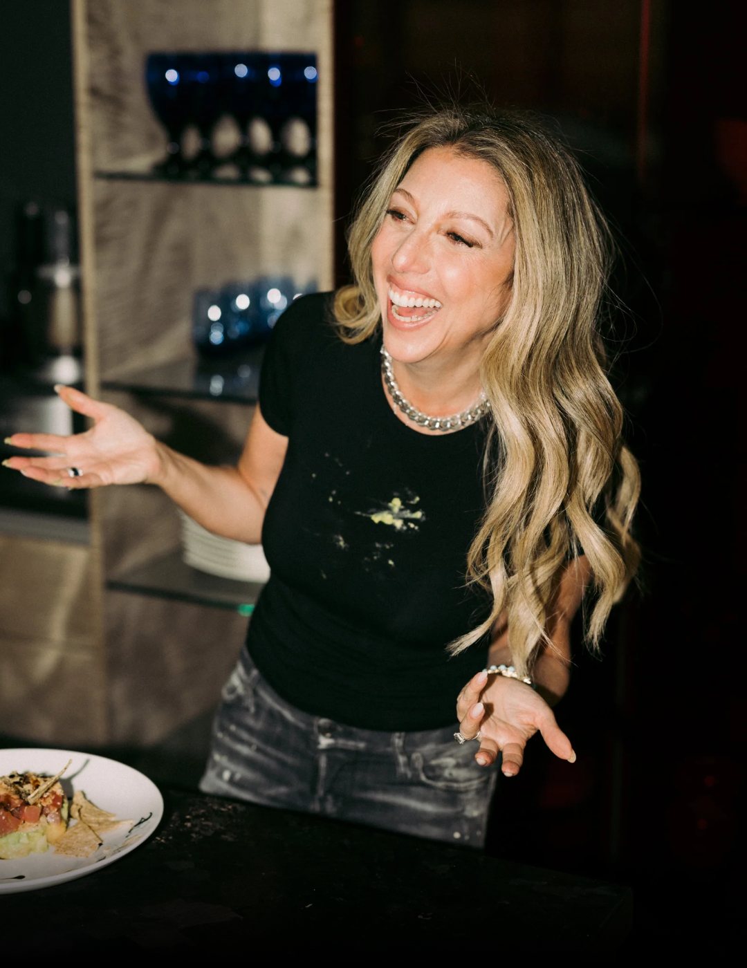 Stephanie Valentine laughing in her kitchen